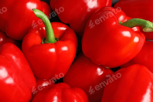 Preview: Many ripe red bell peppers as background, top view