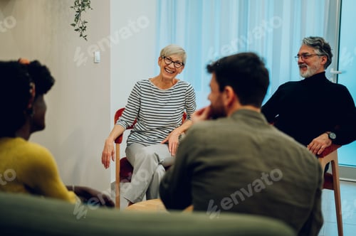 Preview: Senior woman talking about her mental health on a group therapy session