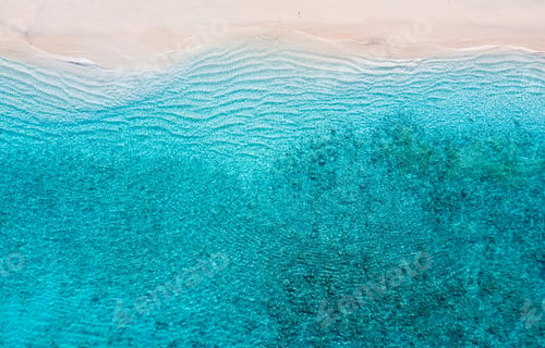 Preview: Beach and ocean as a background from top view. Azure water background from top view.