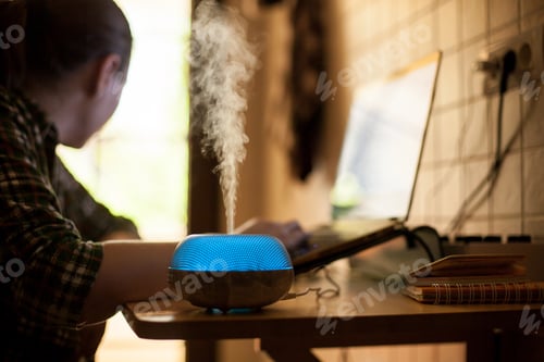 Preview: Vapor coming out from essential oil diffureser