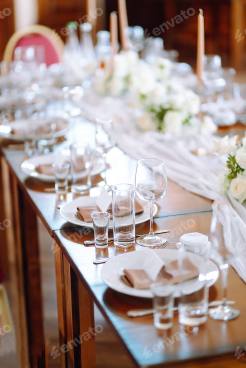 Preview: Beautiful table setting for a party, wedding reception or other festive event. Banquet setting.