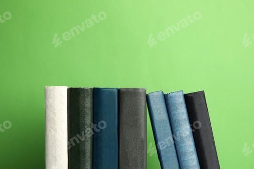 Preview: Collection of old books on green background