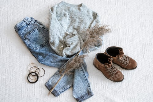 Preview: Set with fashionable women's clothing jeans and a sweater .