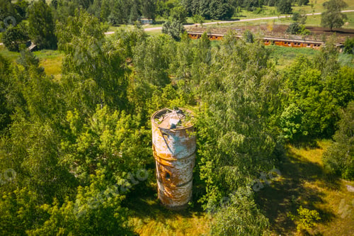 Vista previa: Belarus. Aerial View Of Ruined Water Tower In Chernobyl Zone. Chornobyl Catastrophe Disasters