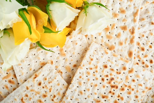 Preview: Passover celebration concept. Matzah, red kosher, white and yellow roses and walnut. Traditional rit