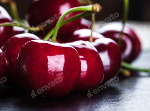 Preview: Sweet Cherries with Stems on Dark Surface