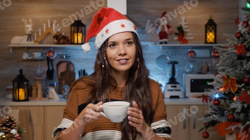 Preview: Cheerful festive woman smiling because of winter season