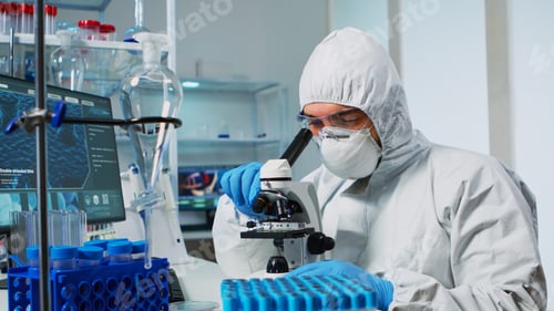 Preview: Research scientist in ppe suit conducting vaccine development