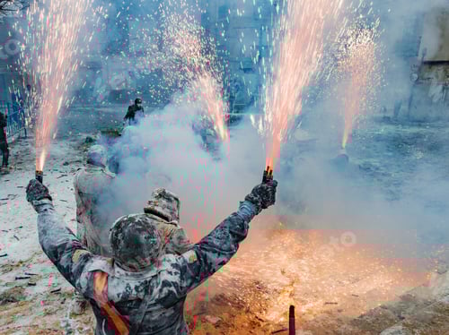 Preview: Ibi, Spain - December, 28 2018: People celebrating victory in flour and eggs battle