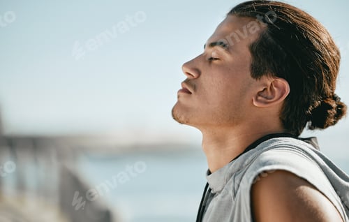 Preview: Tired, fitness and breathing man for cardio training, workout or outdoor running break on blue sky
