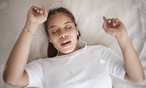 Preview: Relax, sleep and bed with woman listening to music while sleeping in her bedroom from above. Radio,