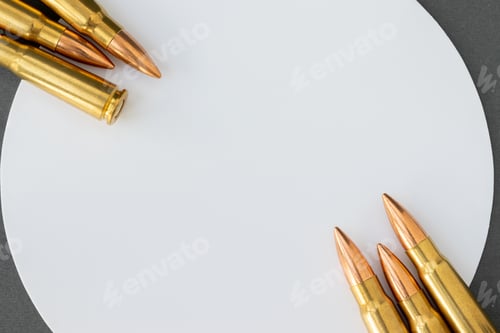 Preview: Bullets at corners of white circle on gray paper background. Cartridges 7.62 caliber