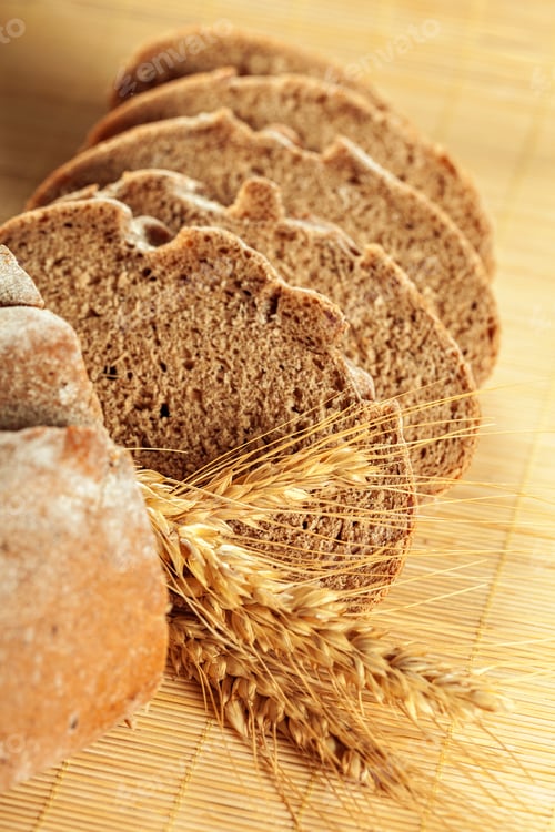 Preview: Freshly baked bread on wooden table