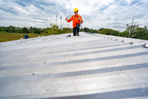 Preview: skilled technician adjusts a solar panel on rooftop