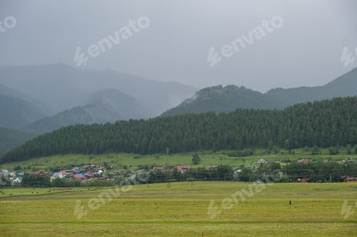 Preview: Amazing view of mountains and forest landscape with cloudy skies Altai