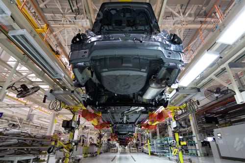 Preview: transfer of car body bottom view. Robotic equipment makes the Assembly of car. Modern car Assembly