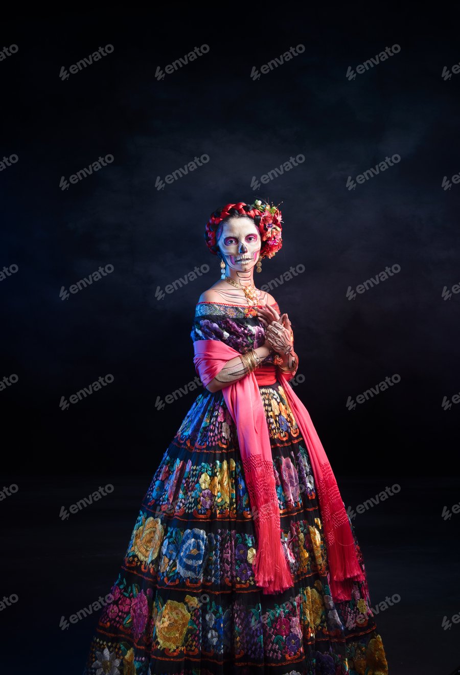 Cover for Latina woman dressed as a Mexican Catrina, with bold skull makeup