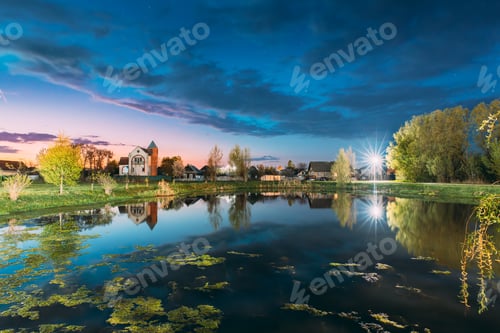 Preview: Countryside Landscape During Spring Flood Floodwaters. Bold Bright Blue Evening Sky Above Nature