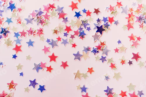Preview: Red and blue Stars Glitter Confetti on pink background. Festive backdrop