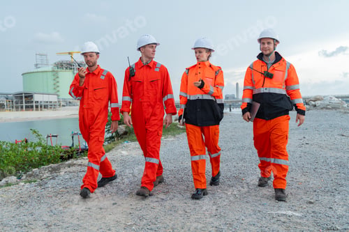 Preview: Engineering Team Walking Along Coastal Worksite