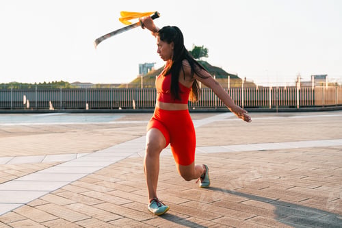 Preview: Chinese young woman practicing wushu kung fu.
