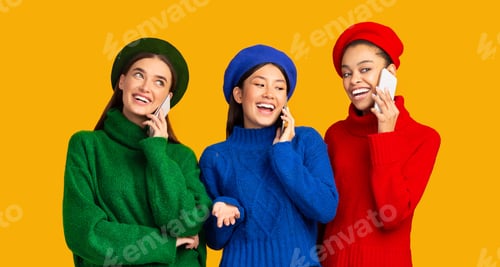 Preview: Three Diverse Girls Talking On Cellphones Standing Over Yellow Background