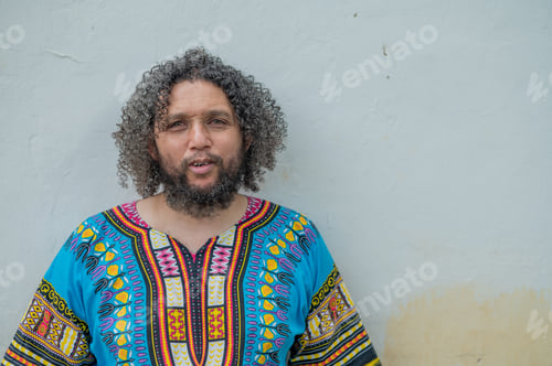 Preview: Man seen in colorful African shirt