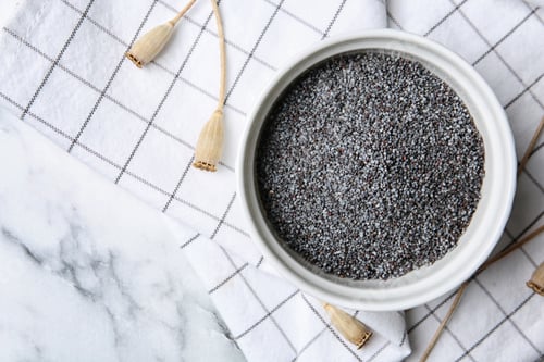 Preview: Flat lay composition with poppy seeds on marble background