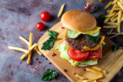 Preview: Hamburger with french fries, beer on a stone table
