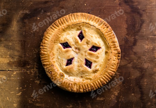 Preview: Rustic cherry pie with milk on wooden background, homemade dessert style