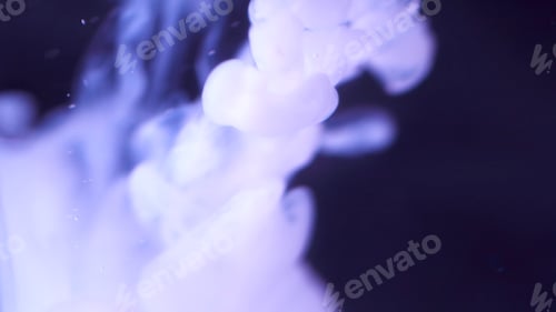 Preview: White soft ink injected in water looking like thick abstract smoke. Beautiful background of liquid