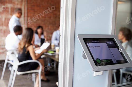 Preview: Screen Of Digital Tablet Booking System Outside Modern Boardroom