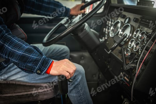 Preview: Driver Operating a Large Truck in a Transport Facility During Daytime