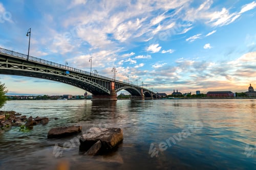 Preview: Beautiful sunset over Rhine / Rhein river and old bridge in Mainz near Frankfurt am Main, Germany.