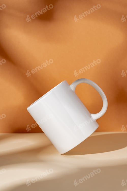 Preview: White ceramic mug on peach background with shadows