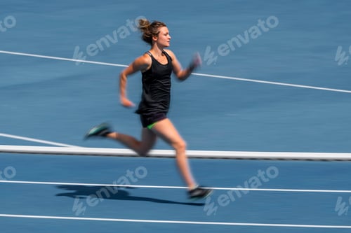 Preview: Female runner on tartan track