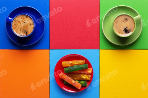 Preview: Cup of coffee and sweets at colorful abstract background