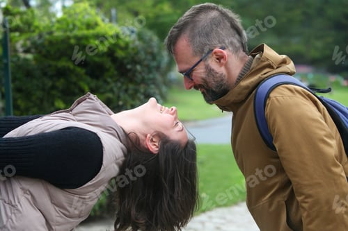 Preview: Cheerful Couple Having Fun Outside