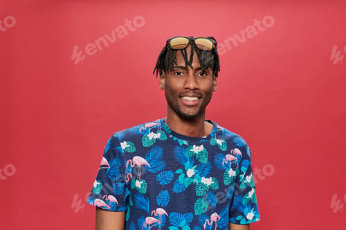 Preview: Handsome smiley african man looking at the camera