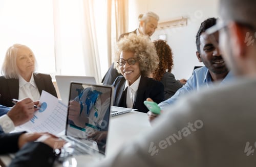 Preview: Young happy afro american businesswoman in a meeting at the office
