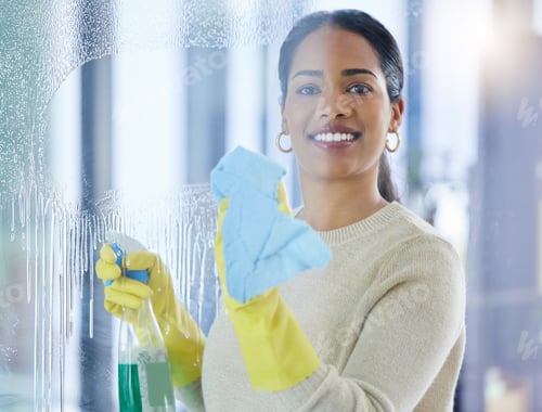 Preview: Cleaning, window and water with a black woman washing a glass pane in a home while sanitizing for h