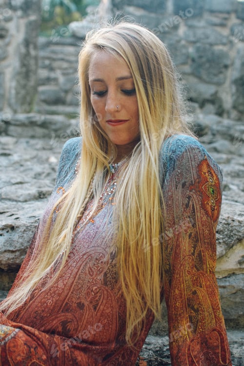 Preview: blonde girl posing in ancient ruins in mexico lifestyle concept