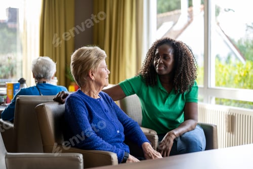 Preview: Helper caring for elderly lady