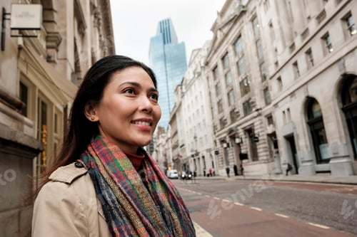 Preview: Woman smiling exploring london city street