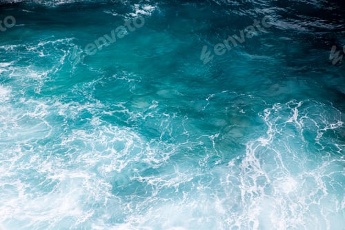Preview: Beautiful ocean water surface with foam. Deep blue color