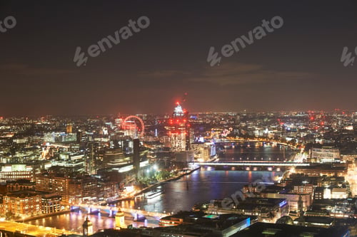 Preview: A dazzling night view of a vibrant cityscape with glowing lights and landmarks.