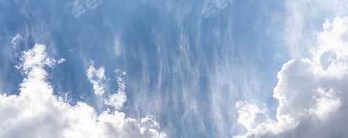 Preview: Blue sky background with a fluffy clouds