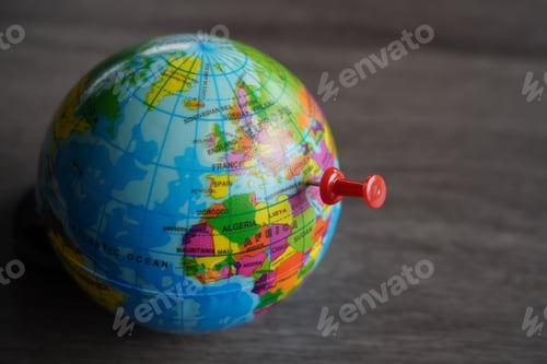 Preview: Close up image of push pin pointing at Gaza, Palestine on world globe.
