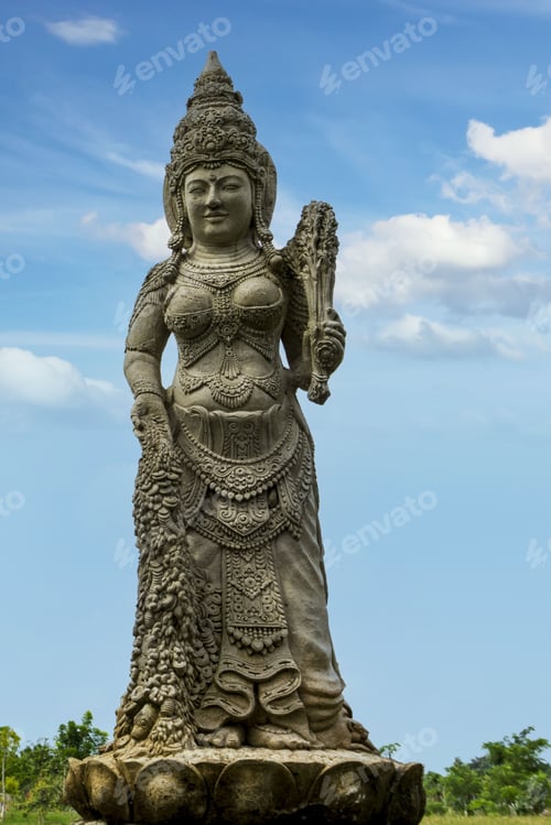 Preview: Statue of Buddhist Tara goddess against the sky