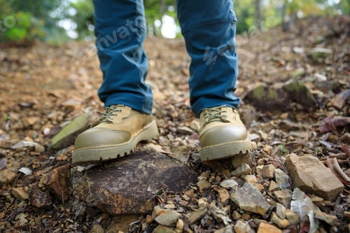 Preview: Legs hiking in spring forest mountain